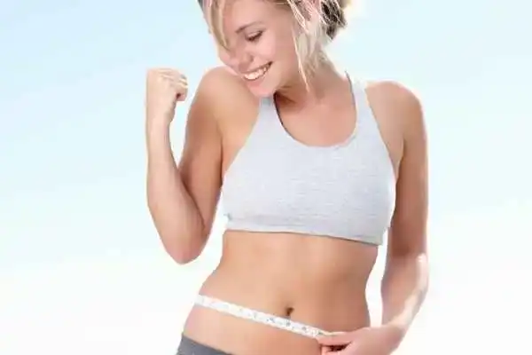 Unraveling the Mystery: Where Does the Body Fat Loss From First? 3 Image of woman happy with fat loss Rickmansworth